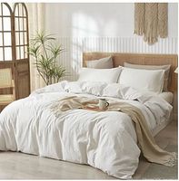 Stock image showing white duvet cover on bed