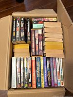 Open box showing rows of paperbacks