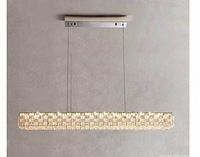 Front view of assembled chandelier hanging, showing crystal grid and suspension system