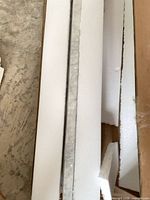 Marble edging in foam packaging, top view