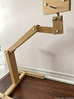 Full view of adjustable wooden needlework stand