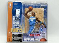 Front of sealed package showing Carmelo Anthony action figure and branding details