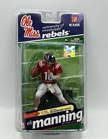 Front view of sealed Eli Manning McFarlane figure in packaging