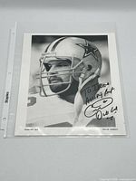 Front view of the autographed photograph within sleeve