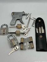 overview of lock pick gun, picks, practice locks and keys