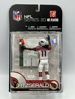 Front of sealed package showing Larry Fitzgerald figure and accessories