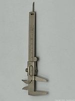 Full view of stainless steel vernier caliper closed