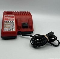 Front view of Milwaukee battery charger with cord