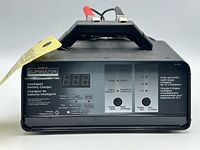 Front view showing control panel, display, branding and specifications