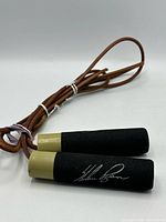 Full jump rope coiled with both handles visible