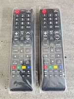 Front view of both sealed Samsung replacement remotes