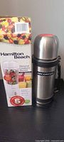 Box of Hamilton Beach blender beside Arcosteel thermos