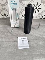 Fly fan device, box, instruction leaflet visible