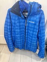 Front view of blue plaid Columbia 3-in-1 jacket