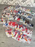 Spread of Upper Deck hockey cards laid out showing variety of teams and players