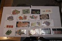 Overview of all 17 stock cards with assorted Canadian and revenue stamps