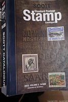 Front cover of Volume 5 showing title and sample stamp images