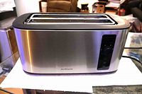 Full view of stainless steel 4-slice toaster