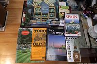 Overview of all nine books and magazines on tabletop