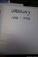 Front of binder album labelled Uruguay 1856-1972