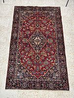 Full view of entire Kashan rug showing size and pattern