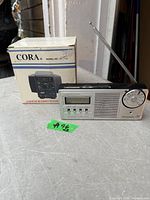 Chronomatic 269 radio in front of boxed Cora DS-444