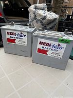 Front of both batteries showing MediChair MK labels