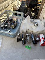 Basket of assorted vacuum tubes, boxed Grado item, wrapped part