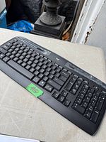 Top view of Logitech wireless keyboard showing full layout and condition