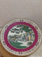 Front view showing full design, rim, central scene