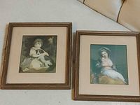 Both framed prints side by side