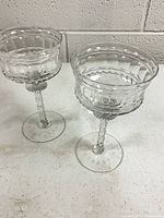 Front view of both crystal stemware pieces