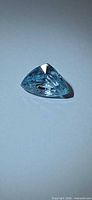 Trillion cut seafoam blue zircon angled view