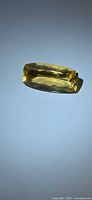 Elongated cushion-cut golden yellow helidor gemstone top view