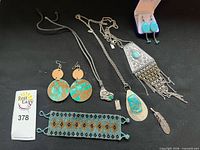 Group overview of all jewelry pieces on black background