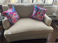 Front view of loveseat with pillows