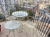 overview of both tables and chair on balcony