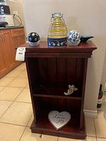 full view wood shelf with decor pieces