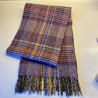 Folded plaid lambswool scarf with fringe