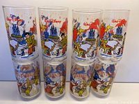 All eight tumblers, four Fantasia and four Cinderella, front views