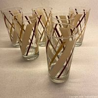 Front view of all six tumblers showing stripe pattern