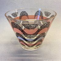 Full view of conical glass ice bucket showing pattern and shape