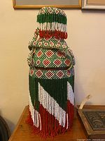 Full view of beaded vessel front