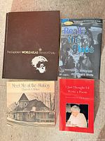 Top view of all four books laid out