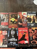 Group shot of all eight VHS tapes fronts