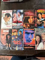 Front view of all eight VHS tapes in two rows
