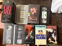 All nine VHS tapes displayed on table