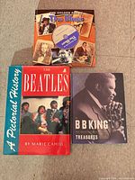 All three hardcover books laid out: The Golden Age Of The Blues with CD, The Beatles: A Pictorial History, The B.B. King Treasures