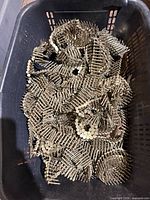 Top view of basket filled with coiled nails
