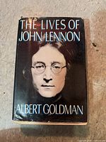 Front cover showing title, author and portrait dust jacket